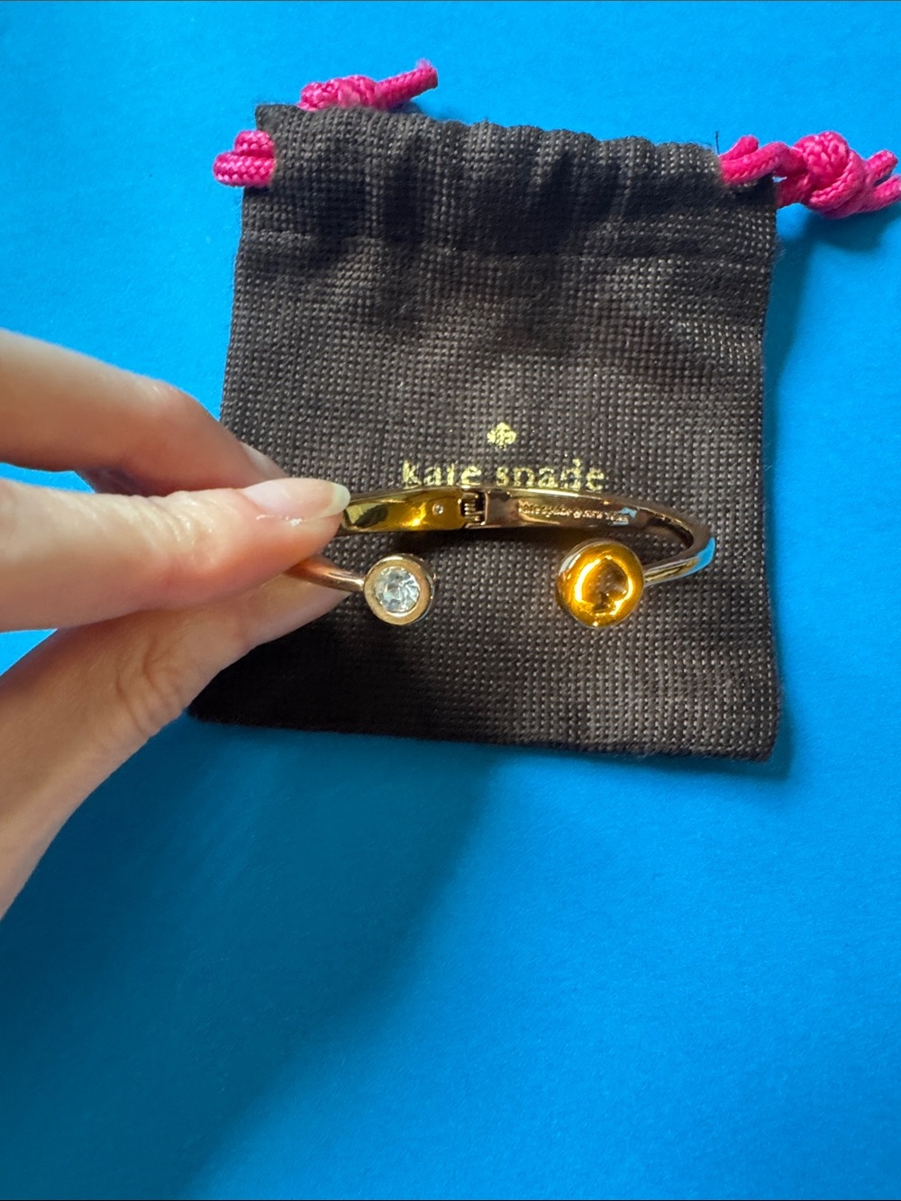 kate spade Rose Gold Tone Bangle with Clear and Black